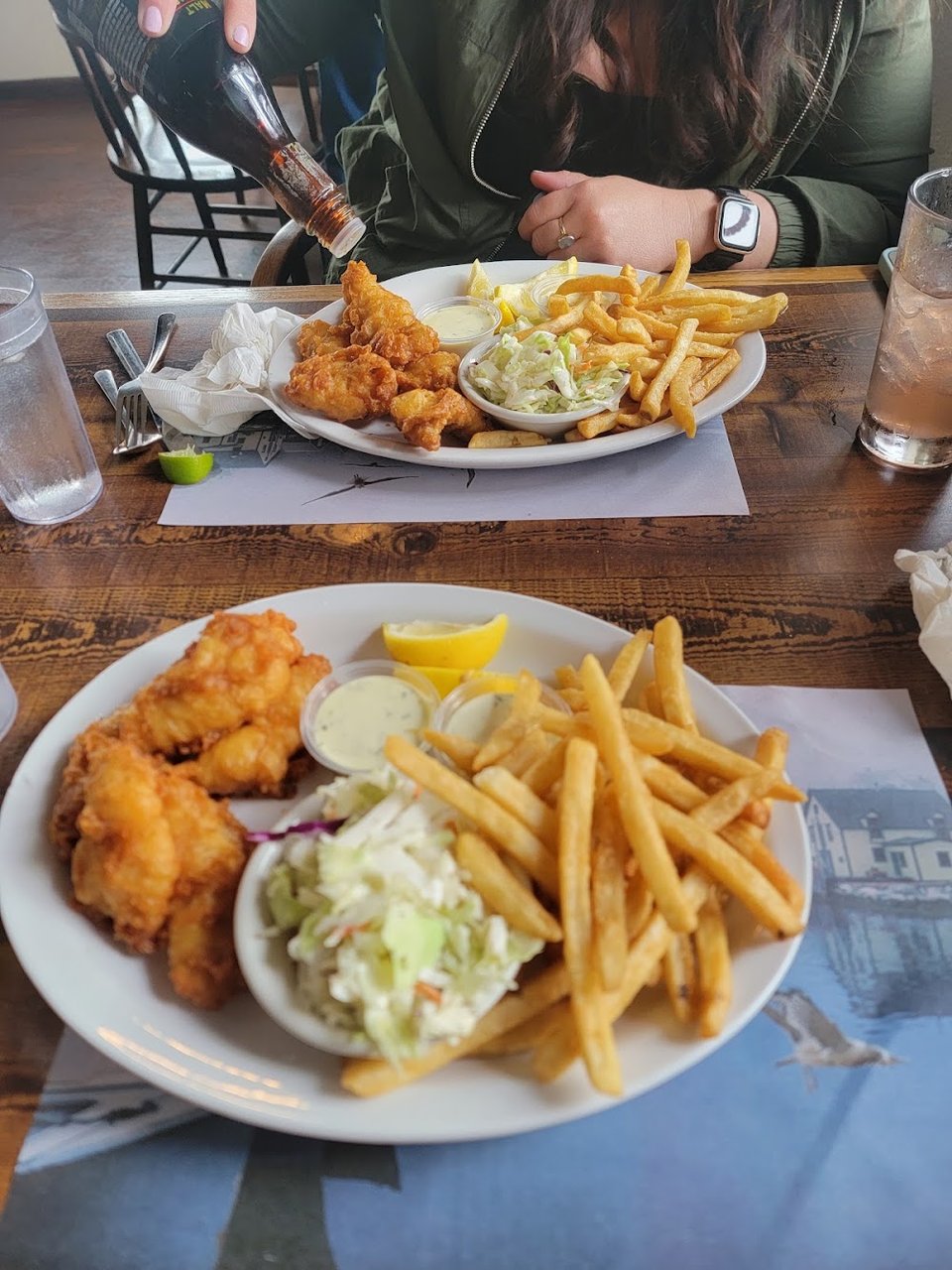 Menu page with seafood sandwiches and beverages.